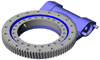 Open slewing rings with integrated worm